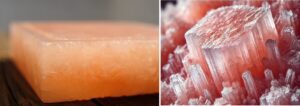 Close-up view of a pink Himalayan salt block showing crystalline structure and mineral-rich composition