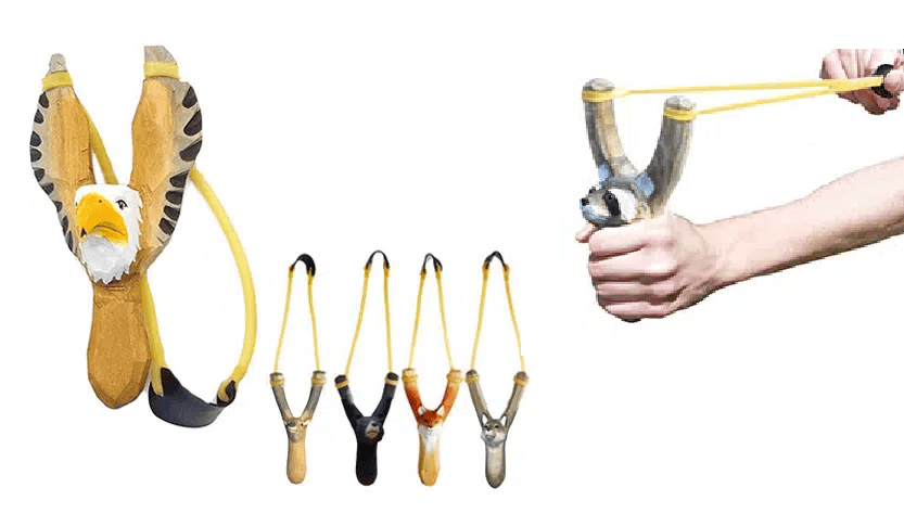 Craftsman hand-carving a wooden slingshot from basswood at Jilin factory