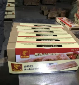 Custom OEM Himalayan salt block and metal tray sets packaged in branded boxes, ready for wholesale export.