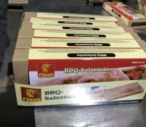 Custom OEM Himalayan salt block and metal tray sets packaged in branded boxes, ready for wholesale export.
