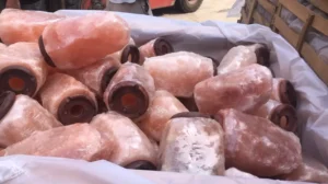 Authentic bulk Himalayan salt products on pallets ready for wholesale export, guaranteed free from artificial dyes.