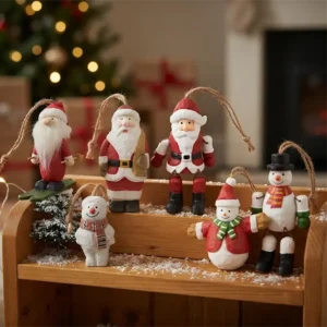 Hand-carved wooden Christmas figurines - Santa and Snowman collection.