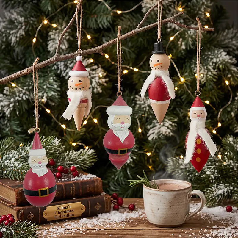 Vintage-style wooden Santa and snowman hanging ornaments on a frosted branch