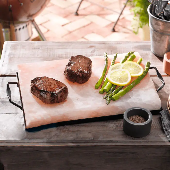 Premium food-grade Himalayan salt block for cooking steak with asparagus, custom bulk wholesale solutions.