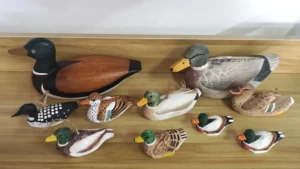 Assortment of hand-carved wooden duck figurines for wholesale export
