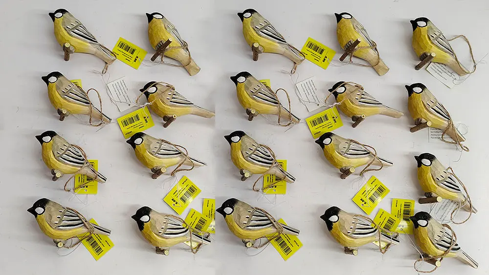 Wholesale hand-carved wooden birds with labels