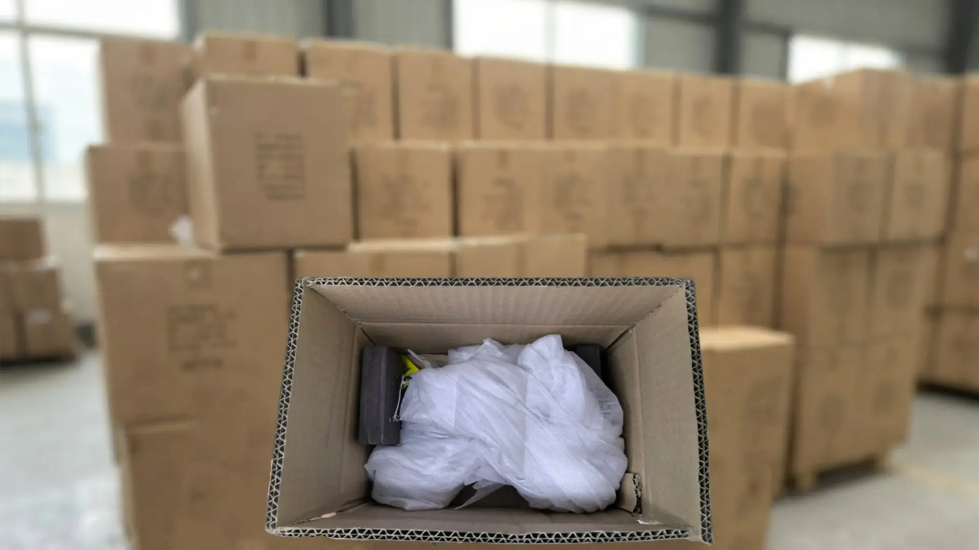 Bulk-packed wooden shorebirds in factory cartons ready for container loading — showing efficient stacked packaging that maximizes CBM utilization