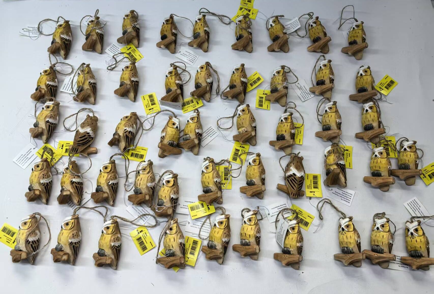 Handcrafted wooden owl carvings in basswood, factory direct from Jilin Ever Creation
