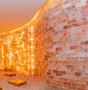 Transform wellness spaces with our precision-cut wholesale Himalayan salt bricks, engineered for complex architectural features like curved backlit walls